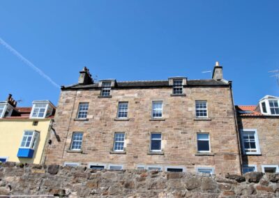 View of four-story property from harbourside.