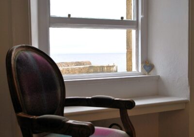 View of the harbour through the lounge window.