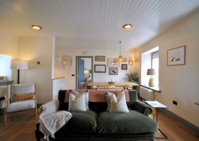 View across sofa in the lounge towards the dining area.